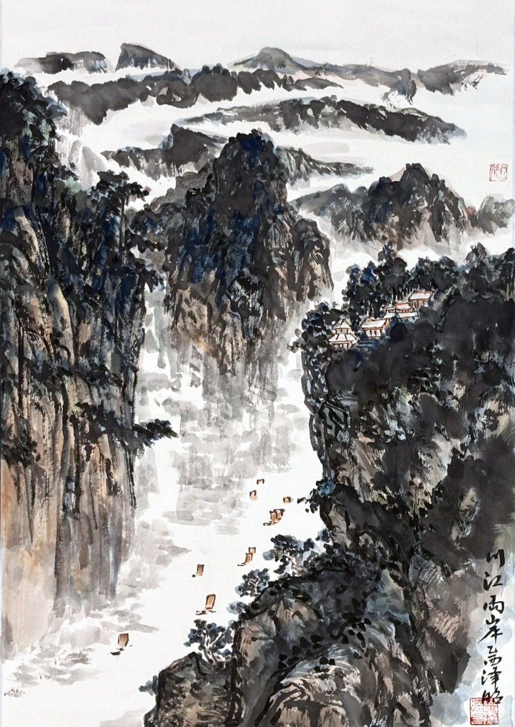 Boats in a misty river gorge