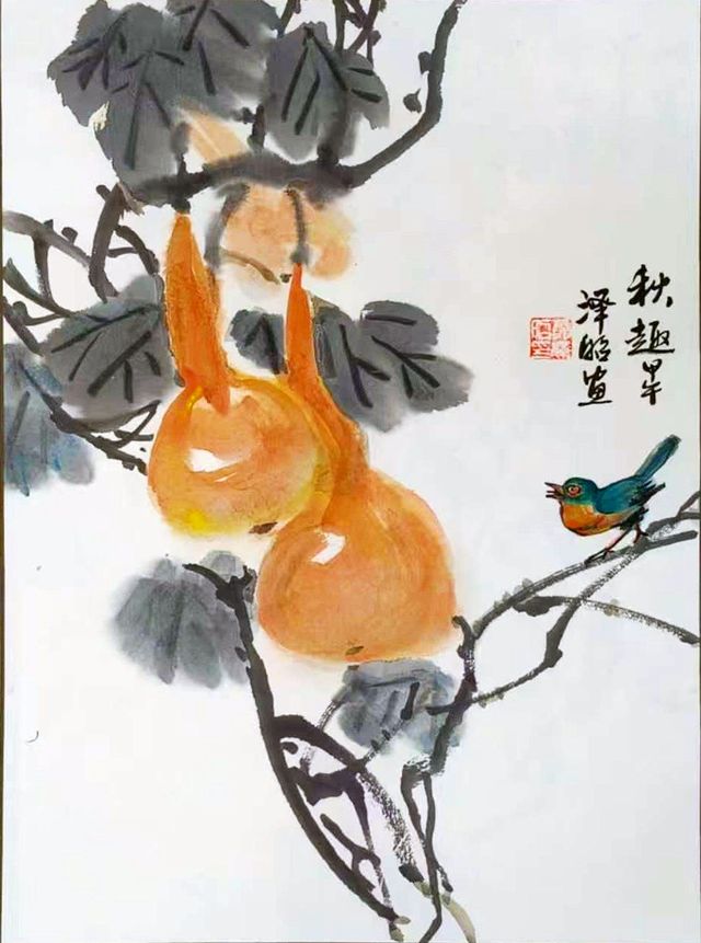 Golden gourds on a vine with a small blue bird