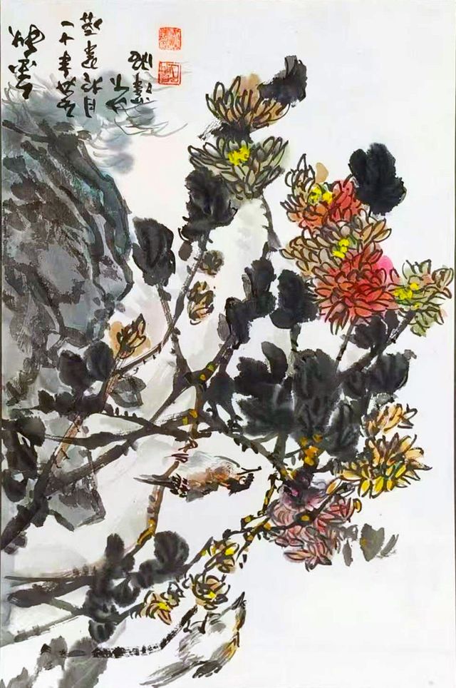 Autumn chrysanthemums and rock