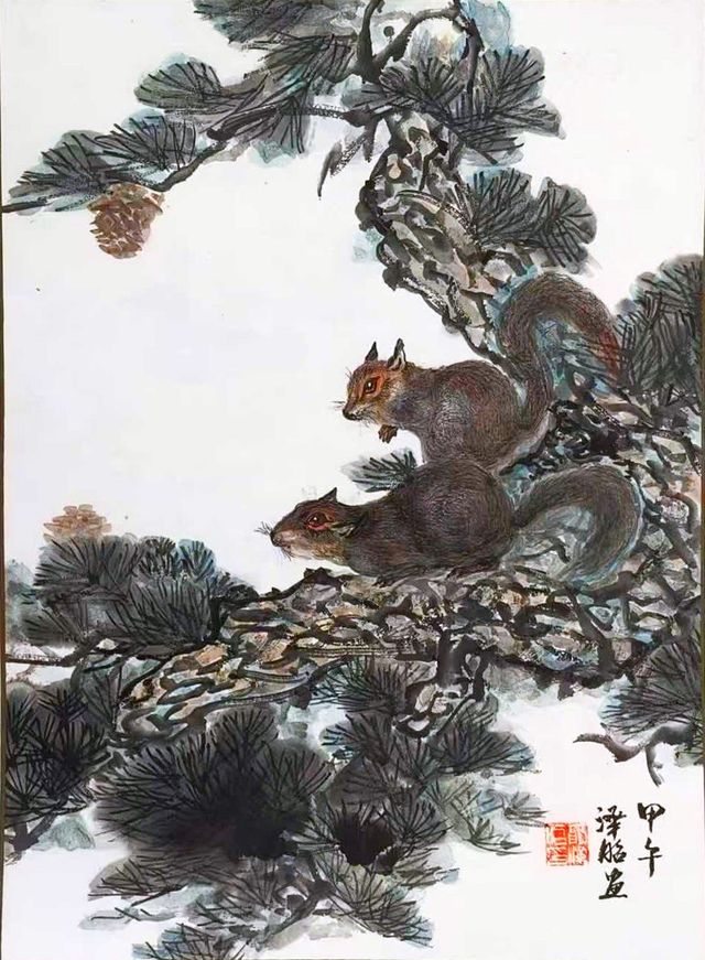 Two squirrels in a pine tree