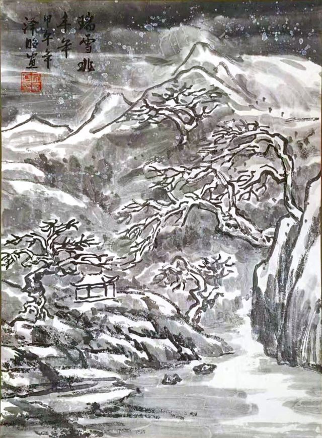Snow-covered trees along a mountain stream