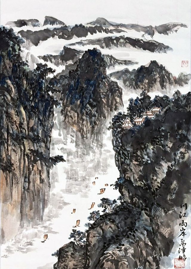 Boats in a misty river gorge