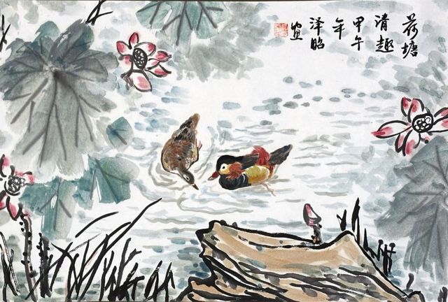 Mandarin ducks in a lotus pond